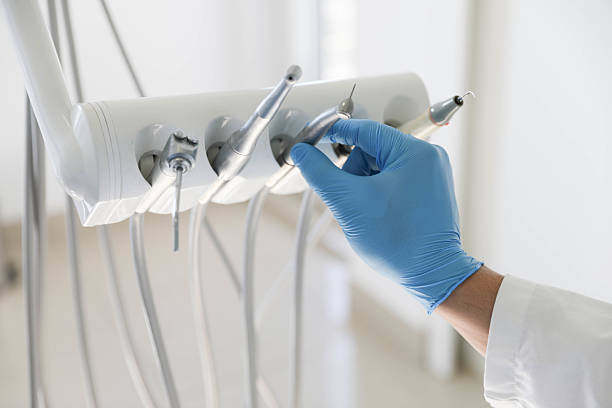 Professional Tooth Extraction technician working in North Newton, KS